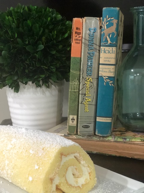 lemon roll cake with whip cream and lemon curd filling