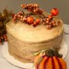 Yellow sour cream cake with caramel icing and thanksgiving decorations